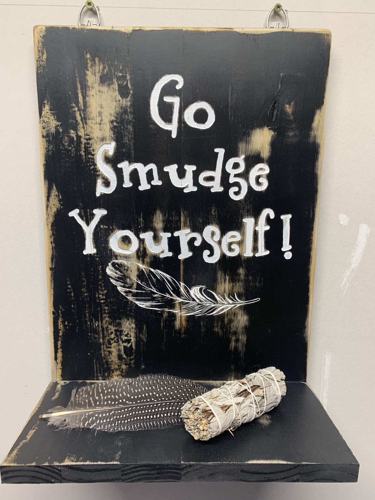 Smudge Shelf  Comes with a stick of sage grass and feather $45.00